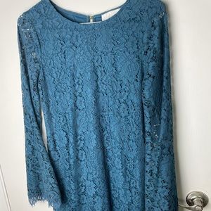 Turquoise Lacey dress with flared sleeves